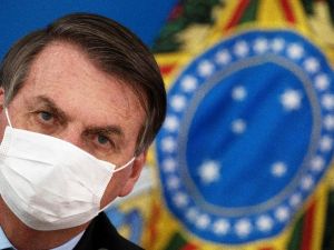 Koronaya yakalanan ve maskesini çıkaran Bolsonaro’ya gazeteciler dava açacak