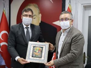 Kuşadası MHP’ye AK Parti ilçe yönetiminden iadeyi ziyaret
