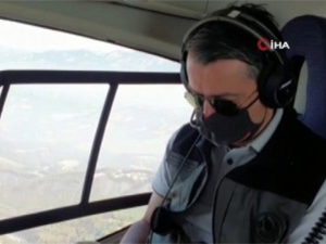 Bakan Pakdemirli helikopterle Hatay’daki yangın bölgesini inceledi