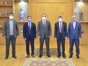 HİTÜ Rektörü Öztürk, DPÜ Rektörü Uysal’ı ziyaret etti