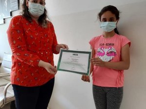 Şiir ve resim yarışması birincilerine başarı belgesi