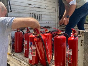 Busader’den yangın bölgesine malzeme desteği