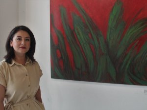 Resim sergisiyle orman yangınlarına ve deniz kirliliğine dikkat çekti