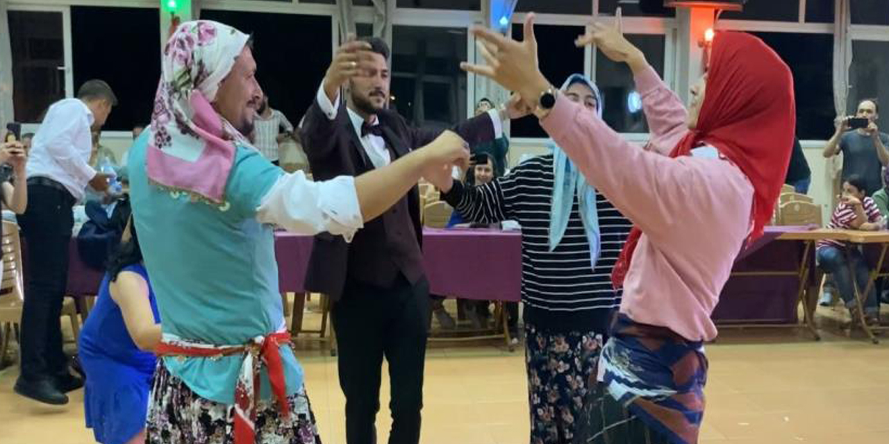 Kadın kılığında düğünü bastılar