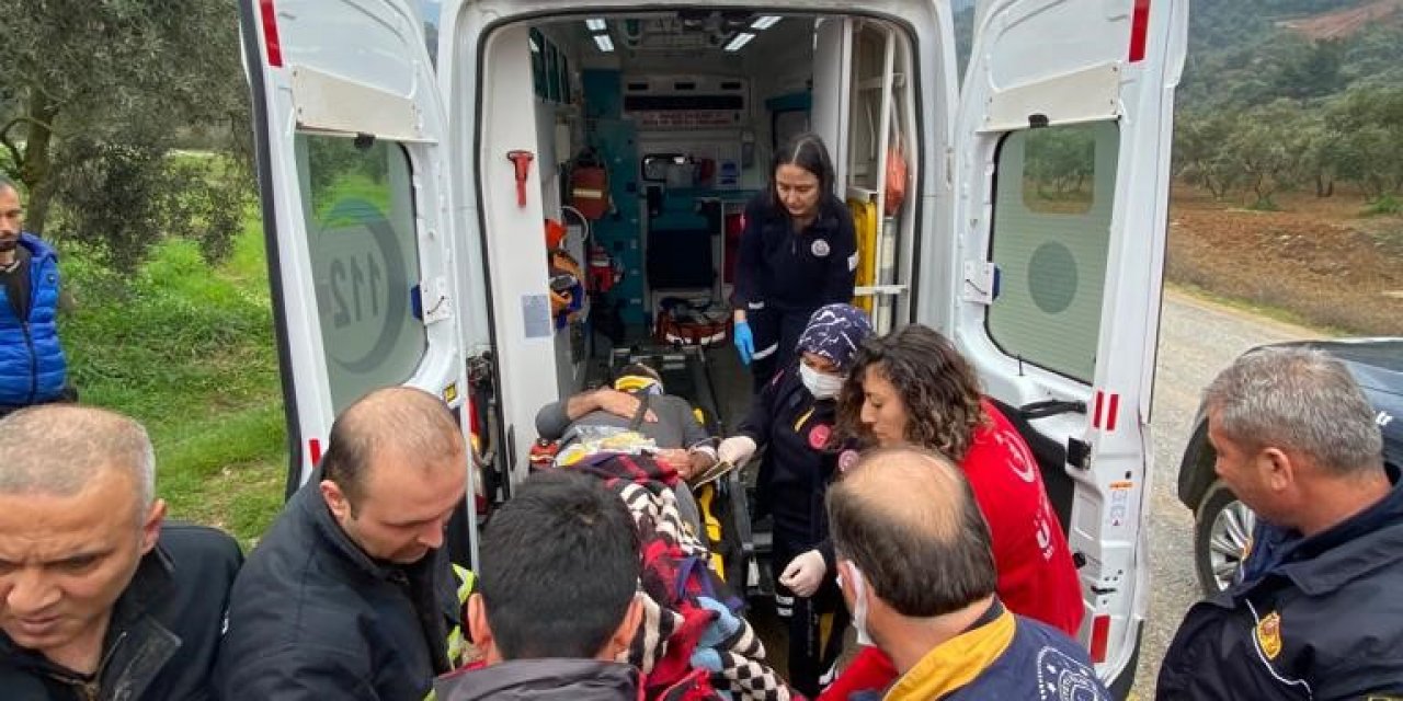 Ters dönen paletli iş makinesinde sıkışan sürücü yaralandı