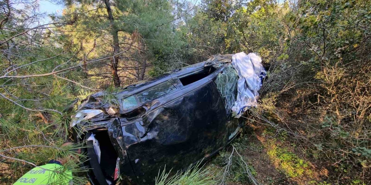 Takla atan otomobilden yaralı kurtuldu