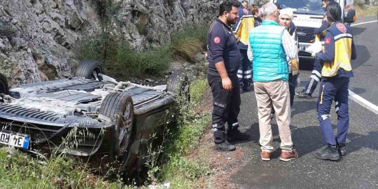 Ters dönen aracın sürücüsü yara almadan kurtuldu