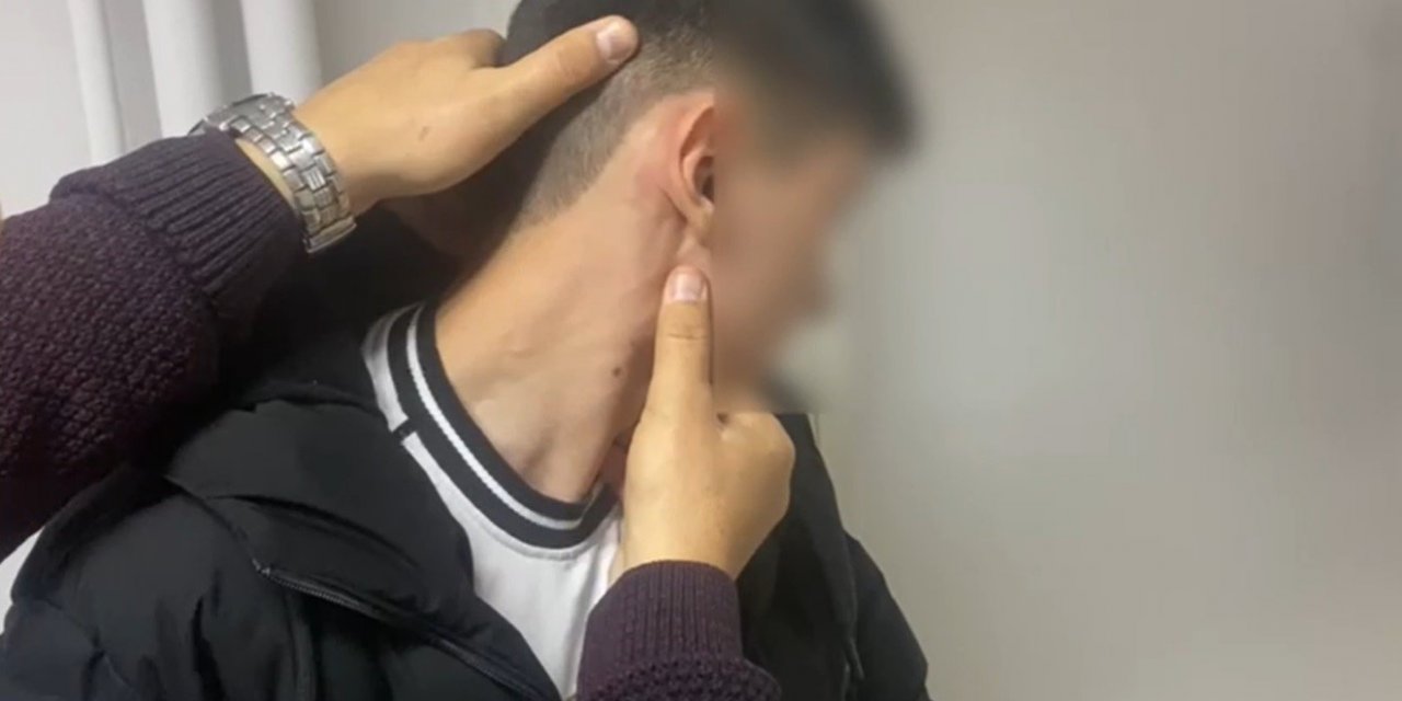 Başkasının yerine ehliyet sınavına girdiler, üzerlerinden özel düzenek çıktı