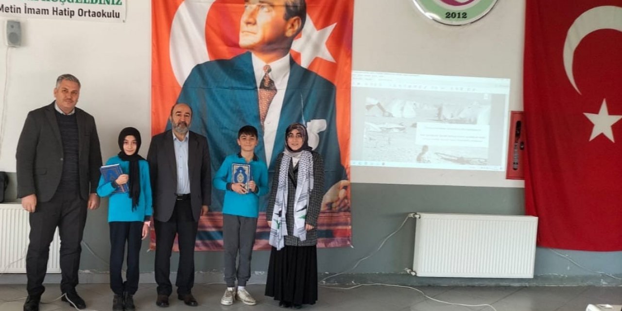 Okul birincilerine Kur’an-ı Kerim hediye edildi