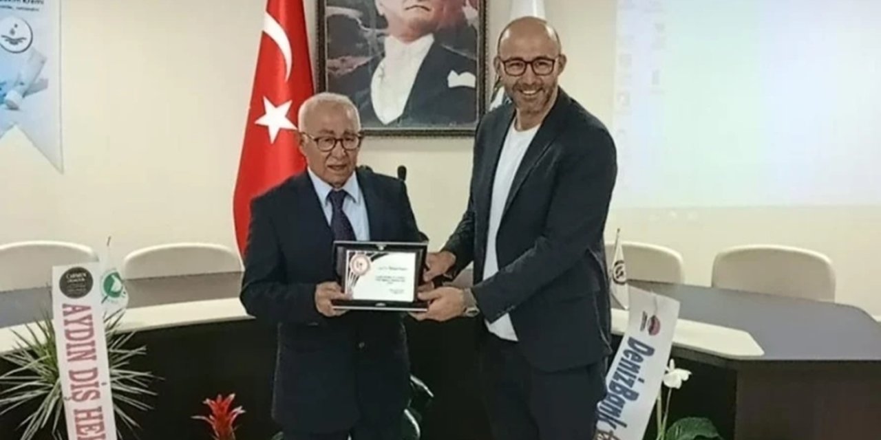 Meslekte 50. yıl onur plaketini oğlu Başkan Zencirci’nin elinden aldı