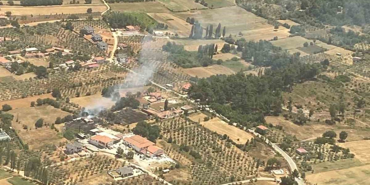 Menteşe’de arazi yangını ekiplerin zamanında müdahalesi ile söndürüldü