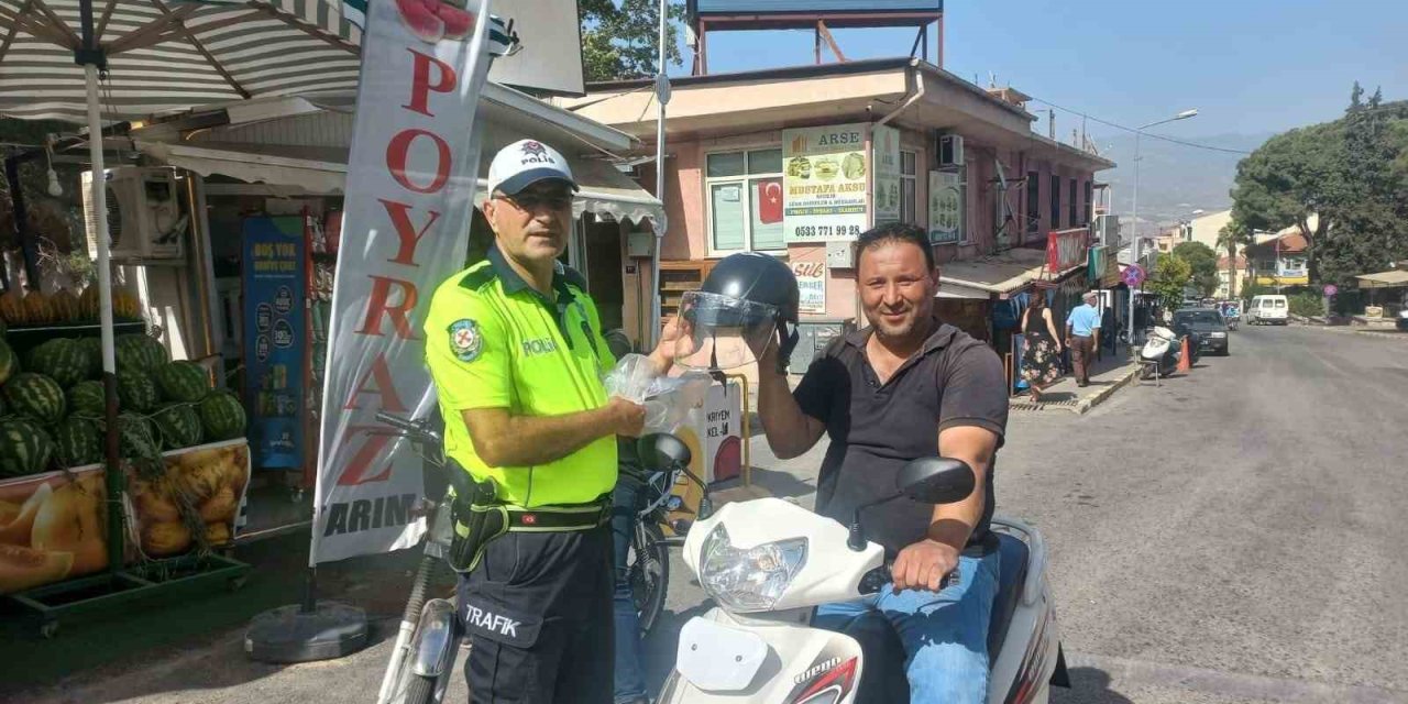 Bozdoğan’da motorculara kask dağıtıldı