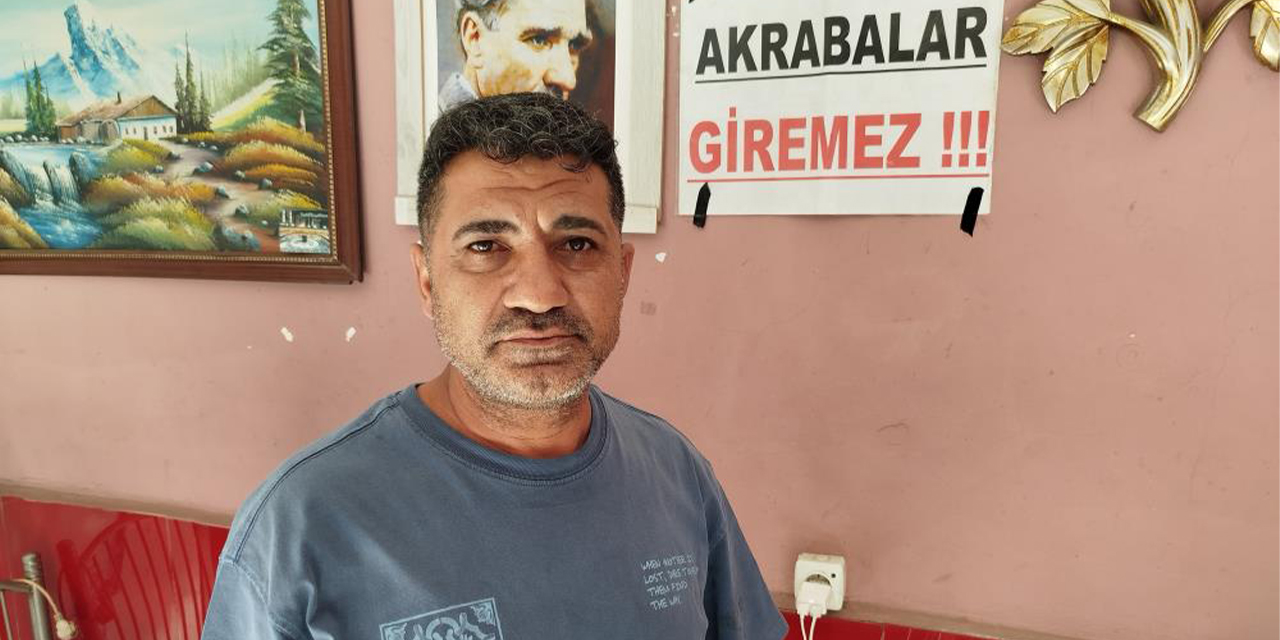 Dükkanına ’Akrabalar giremez’ pankartı astı