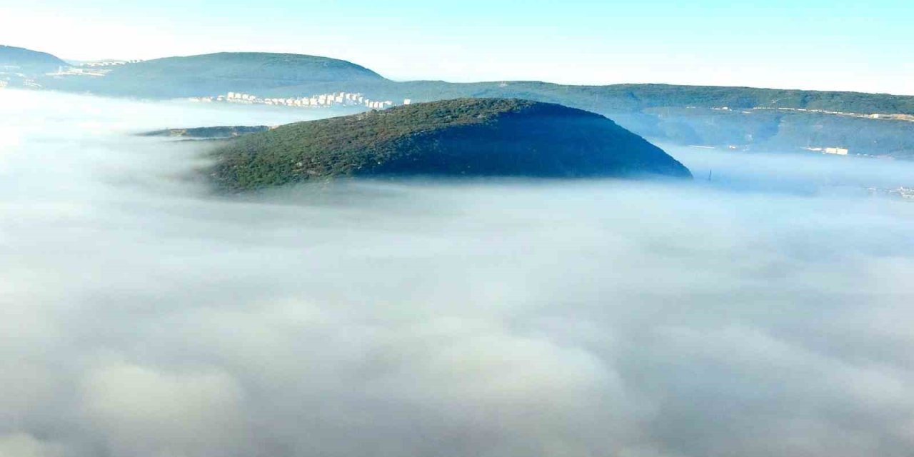 Sisler içindeki Menteşe kartpostallık görüntüler sundu