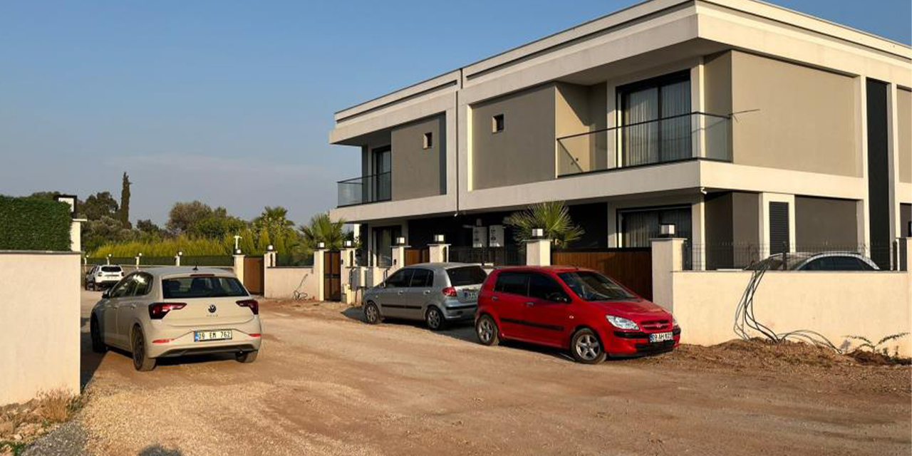 Efeler’de toz çilesi: Mahalle sakinleri yol istiyor