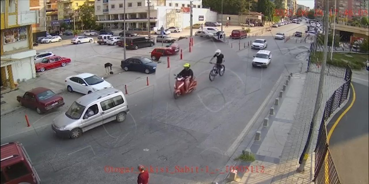 Motosiklete bağladığı iple ana yolda bisikleti çeken sürücü cezasız kalmadı