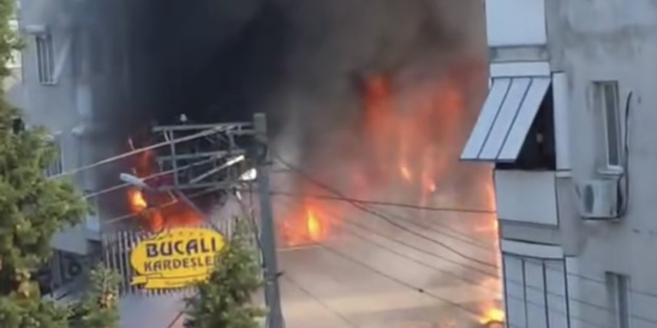 Alevlerin yükseldiği binada yangın paniği