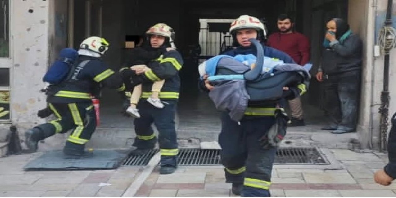 Ev olarak kullanılan iş hanında çıkan yangında 17’si çocuk 21 kişi kurtarıldı