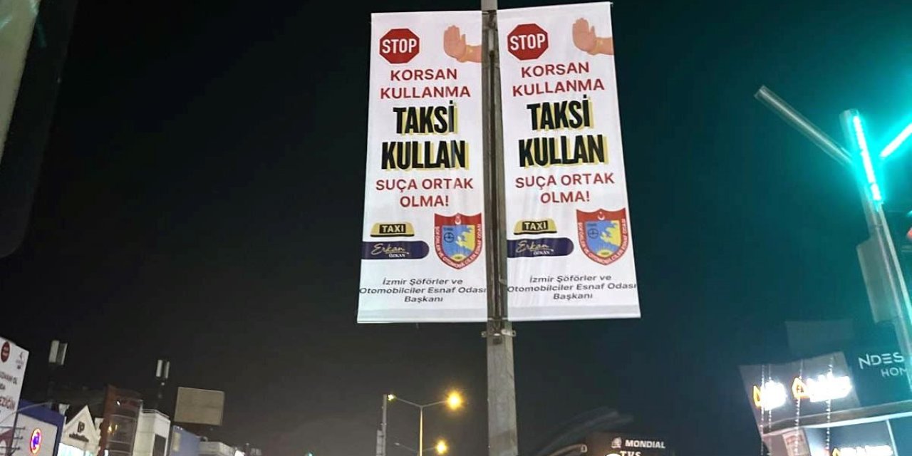 İzmirli taksiciler şehir geneline "korsan kullanma" afişleri astı