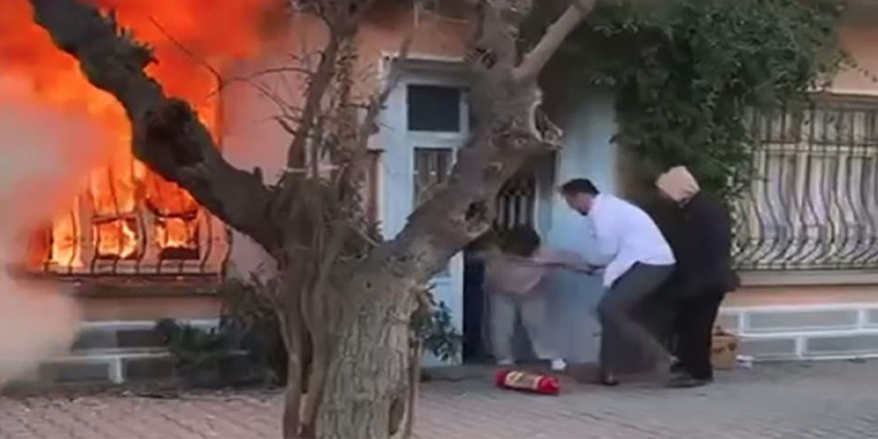 Kedisi için alevlere daldı