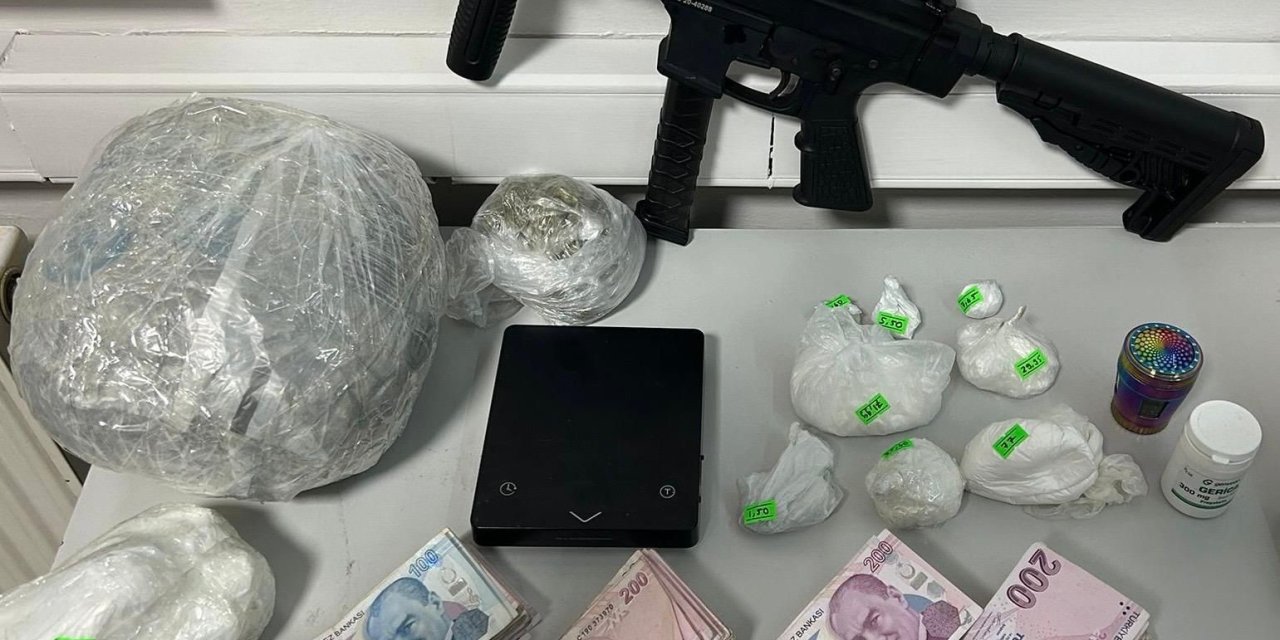 Cinayet zanlısı, hobi bahçesinde otomatik silah ve uyuşturucuyla yakalandı