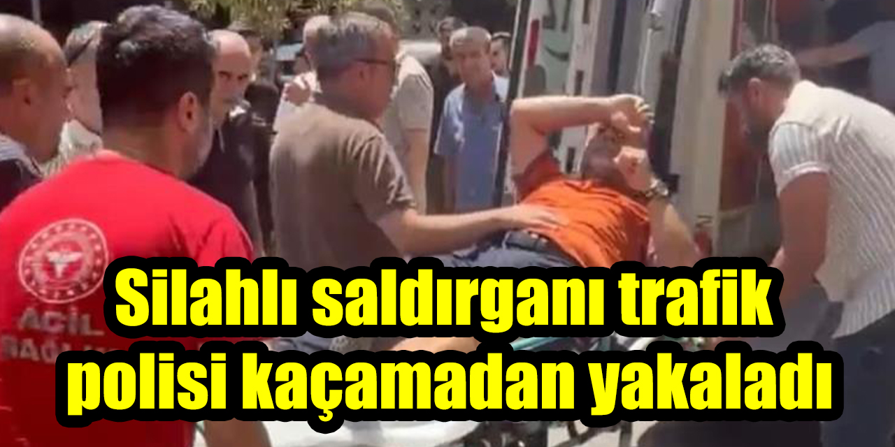 Silahlı saldırganı trafik polisi kaçamadan yakaladı