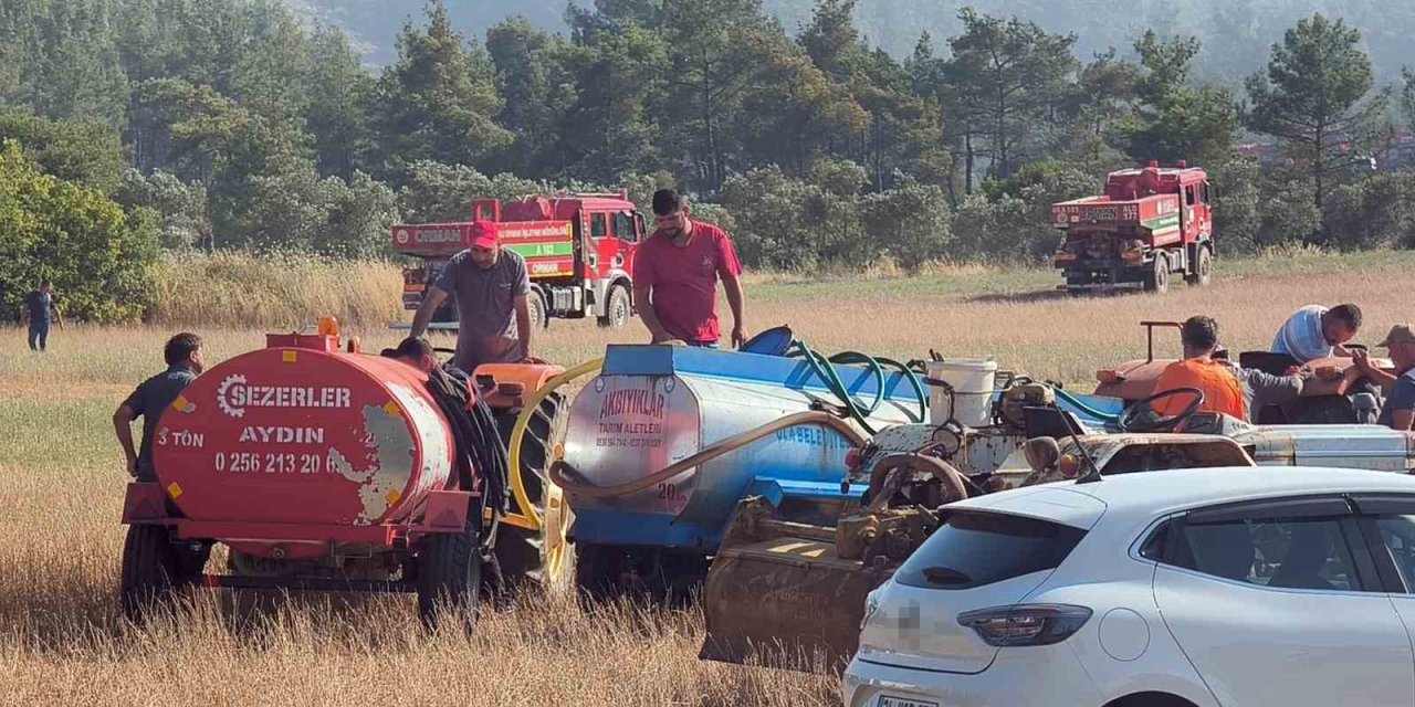 Traktörünü ve su tankerini alan yangına koştu