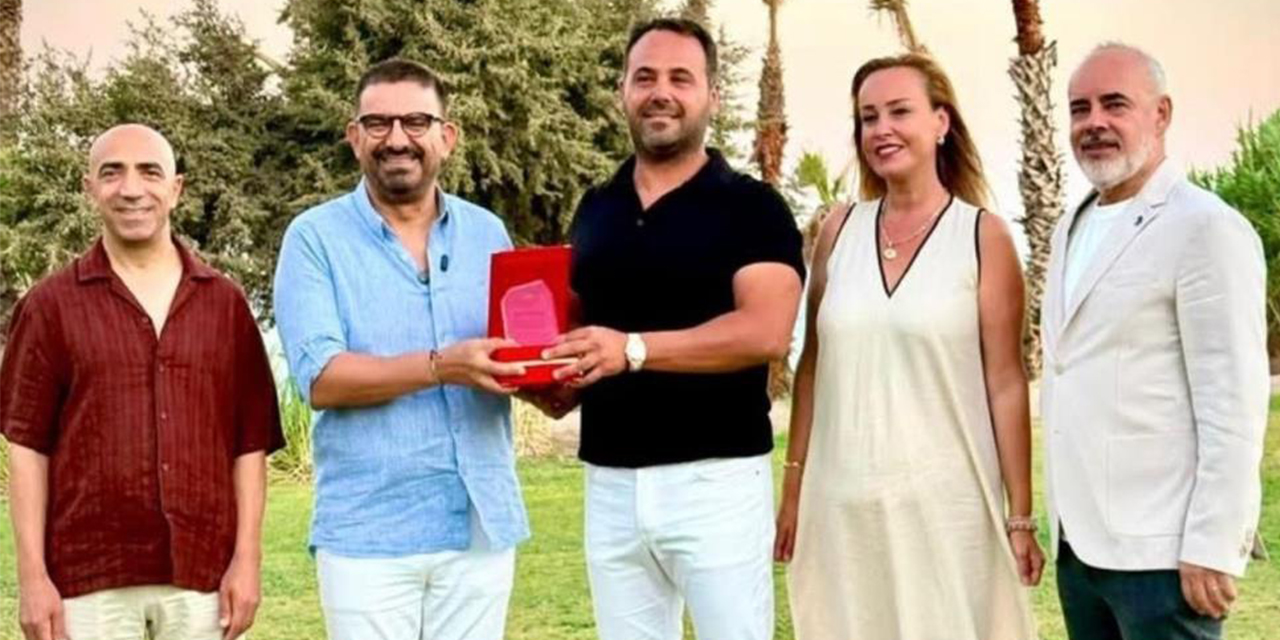 Yüksek lisans tezini plajda hayata geçiren çevreci işletmeciye ödül